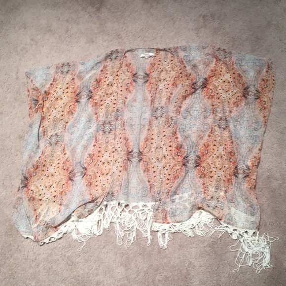 Patterned kimono with tasseled bottom - Picture 1 of 1